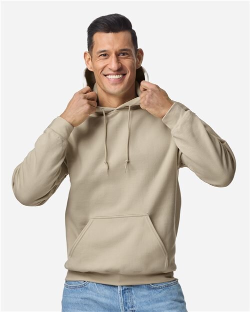 Model in a blank sand Gildan 18500 hoodie